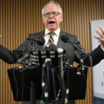 Tim Walz speaks during a press conference focused on Minnesota’s new paid family leave policy.