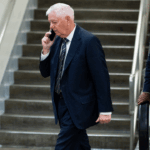 Sen. Lindsey Graham, R-S.C., walks through the Senate subway area in the U.S. Capitol with a security detail on Tuesday, June 2, 2026. (Bill Clark/CQ-Roll Call, Inc via Getty Images)