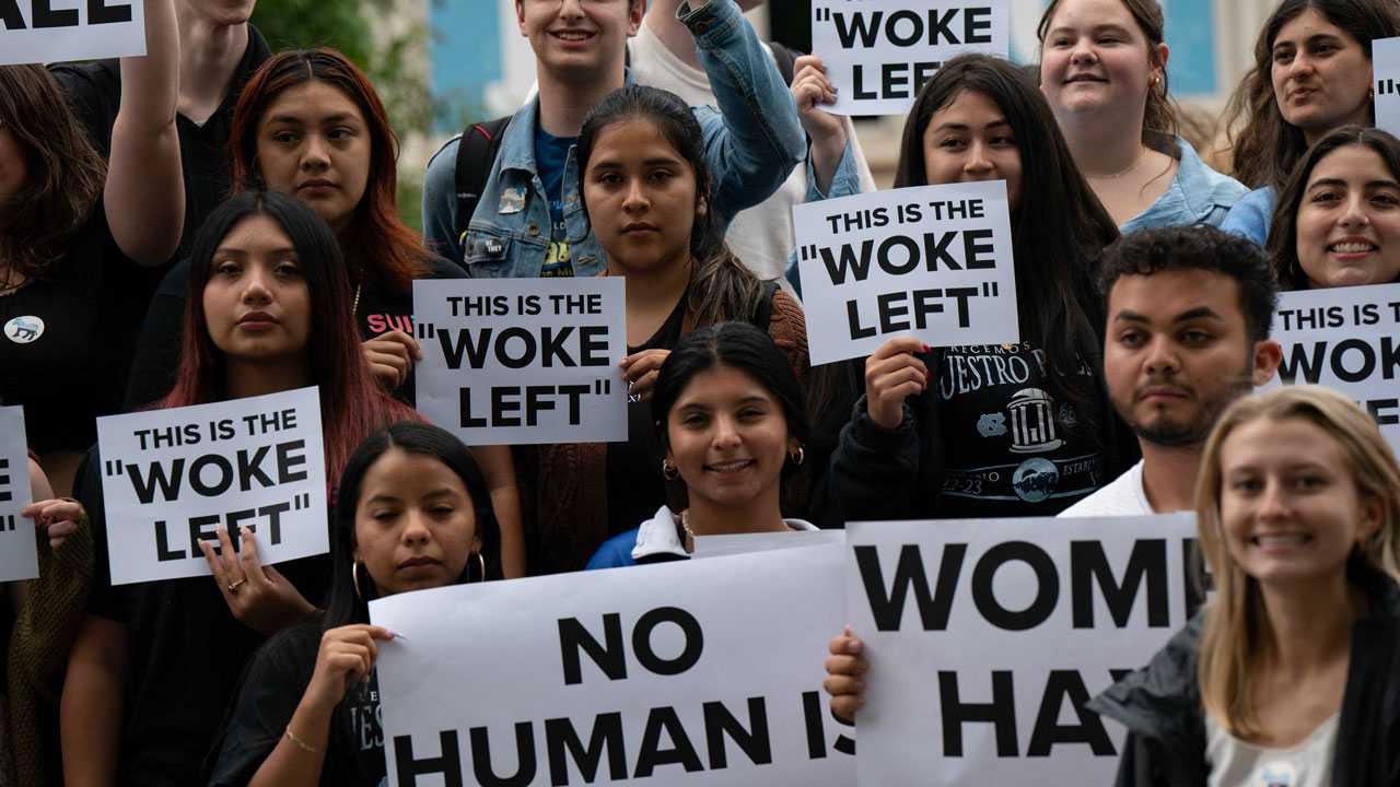 Protesters gather outside the University of North Carolina Chapel Hill where former US Vice President Mike Pence speaks about "Saving America from the Woke Left," in Chapel Hill, North Carolina, on April 26, 2023.