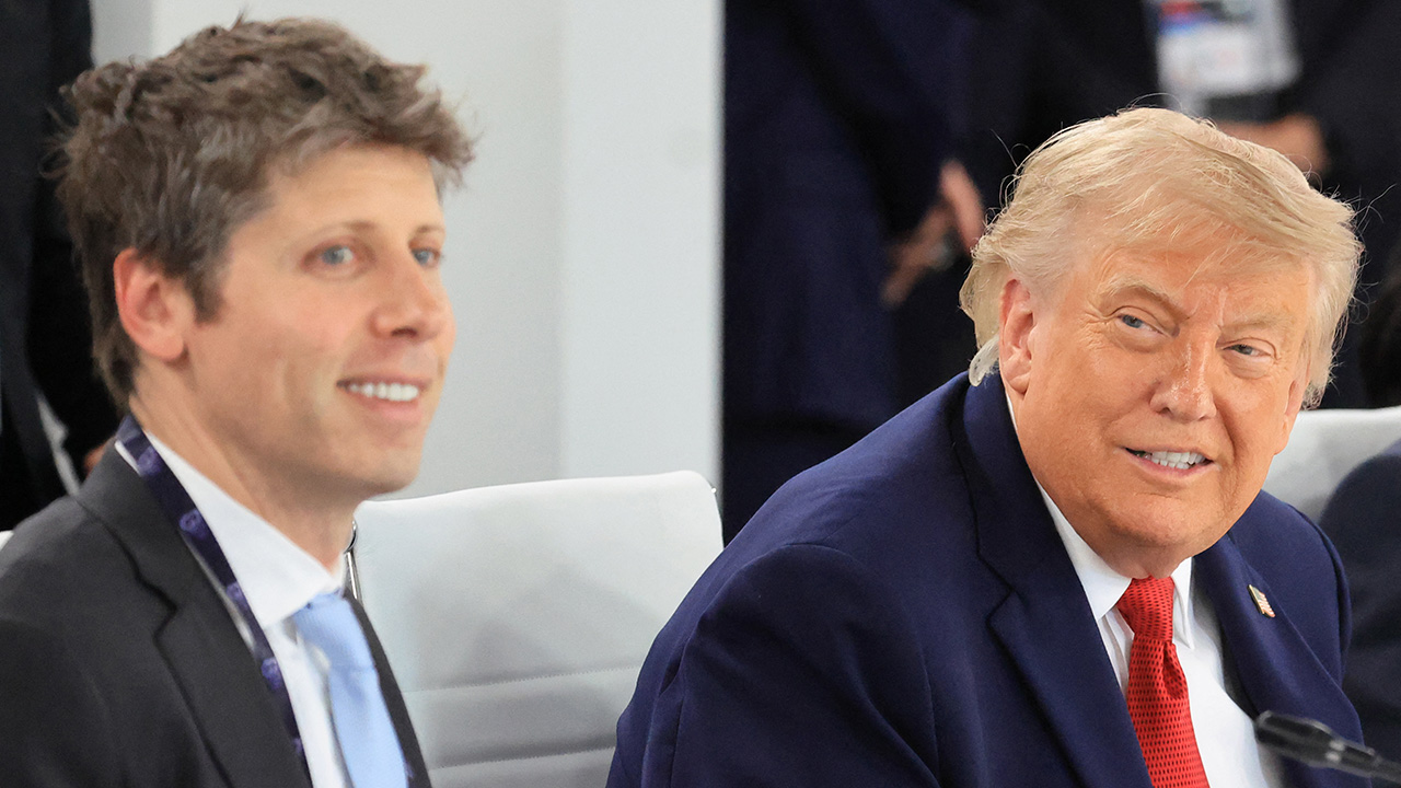 Home 1 OpenAI CEO Sam Altman sits next to President Donald Trump. (Ludovic Marin/AFP/Getty Images)