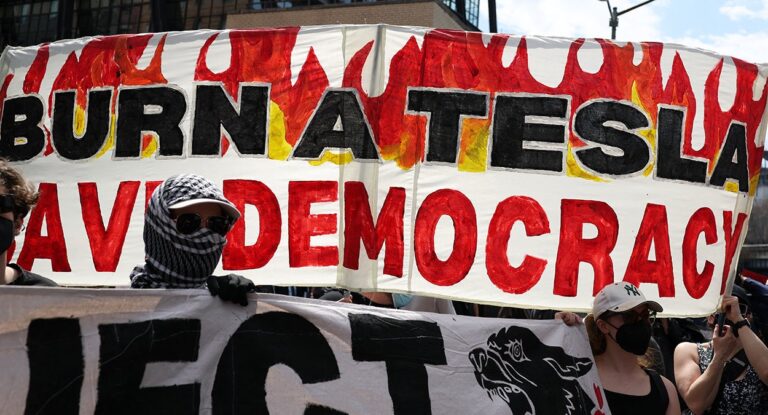 Who’s Funding the ‘Burn a Tesla, Save Democracy’ Protests?