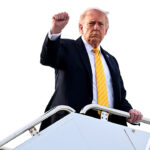 President Donald Trump raises a fist as he departs Doral, Florida en route to his Palm Beach mansion on May 02, 2026 in Palm Beach, Florida. (Roberto Schmidt/Getty Images)