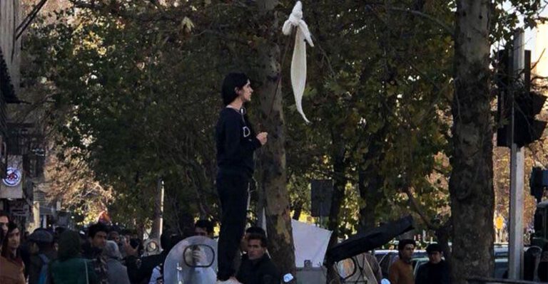 As American Women Put Their Pink Hats Back On, Women in Iran Rip Off Their Hijabs