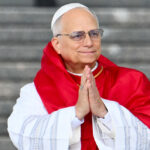 Pope Leo prays.