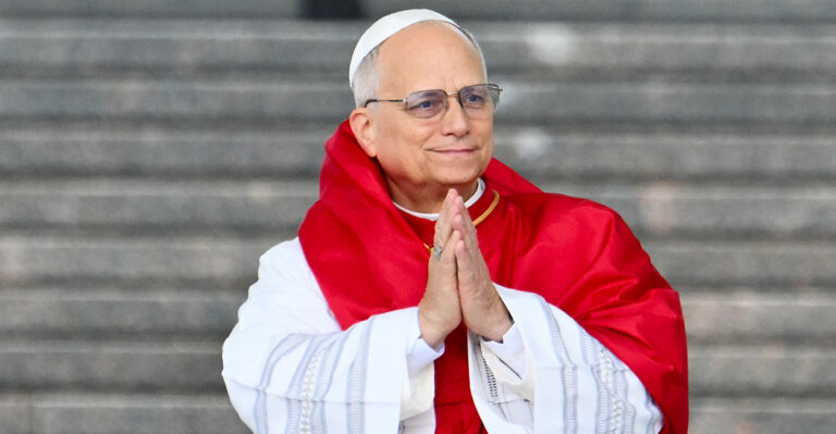 Pope Leo prays.