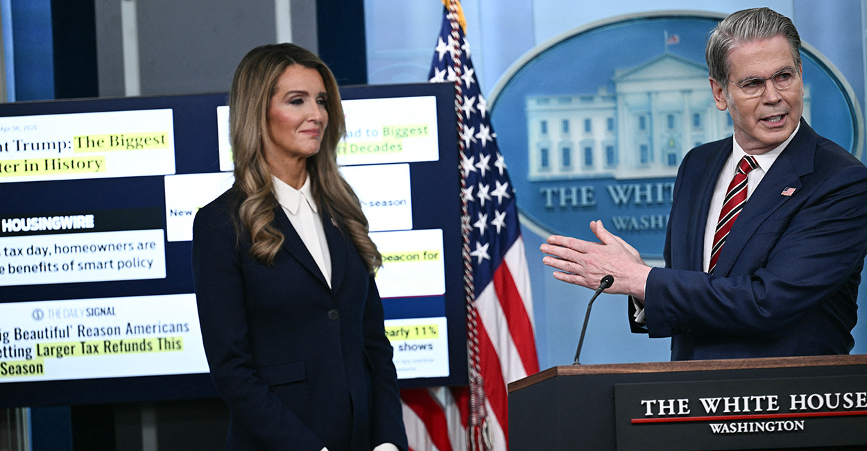 Kelly Loeffler stands at the podium