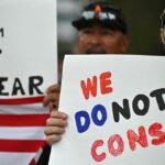 Federal Employee Vaccine Mandate Could Result in Thousands of Firings. Here’s What That Means for Government Functions.