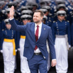 Vance waves at U.S. Air Force commencement ceremony. Pool/Getty Images