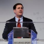 Arizona Governor Says 'Cut It Out' to Ban on Unlicensed Haircuts for Homeless Vets